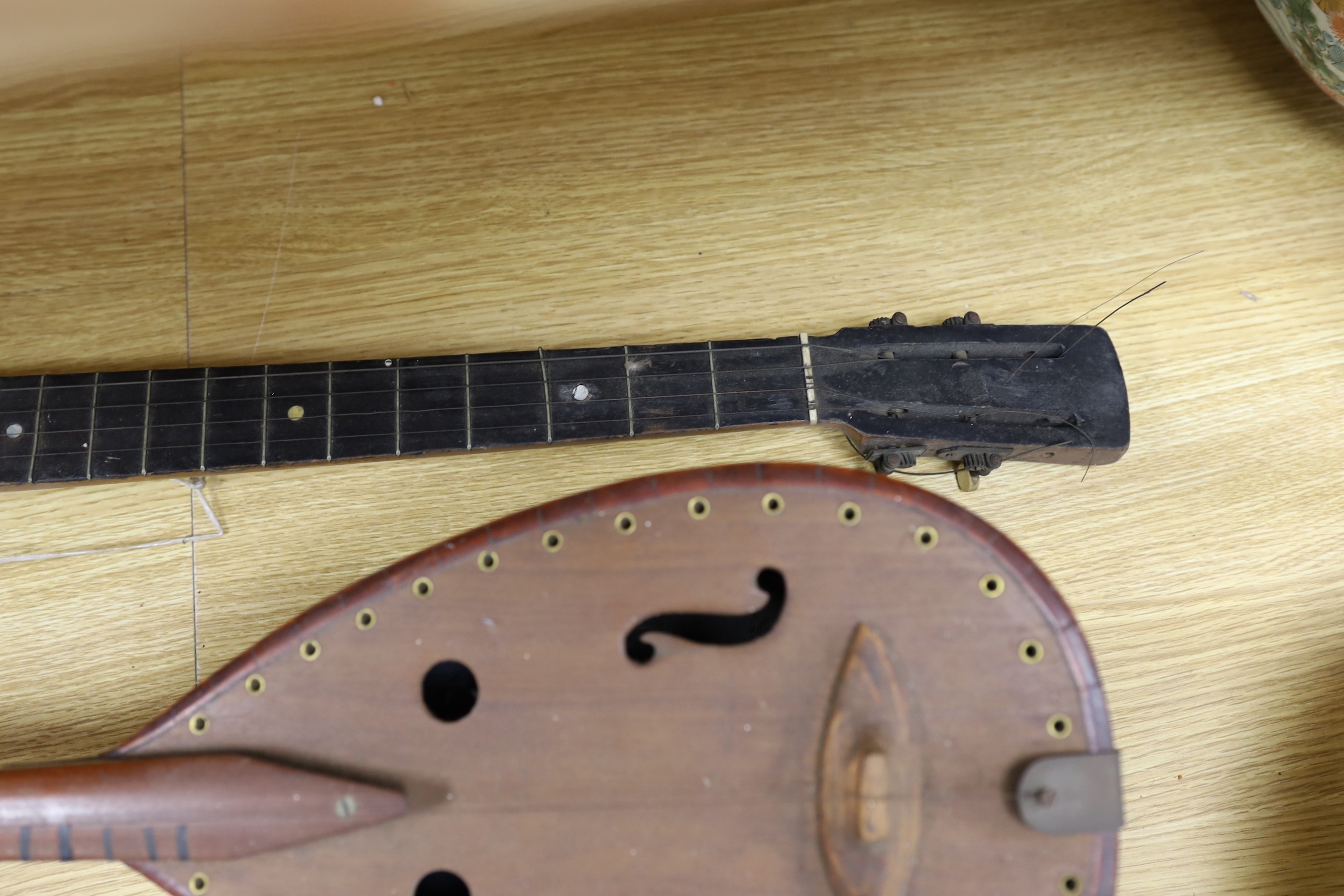 Three various stringed instruments - attention needed